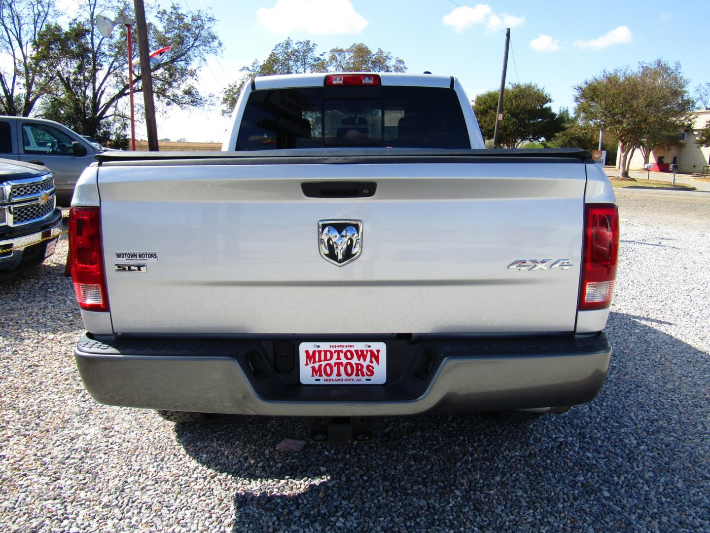 2011 Silver Dodge Ram 1500 Sport Quad Cab 4WD (1D7RV1GT9BS) with an 5.7L V8 OHV 16V engine, Automatic transmission, located at 15016 S Hwy 231, Midland City, AL, 36350, (334) 983-3001, 31.306210, -85.495277 - Photo#3